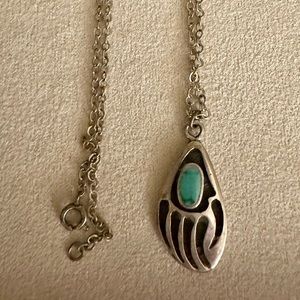 Native American Bear Claw pendant in sterling silver and turquoise.